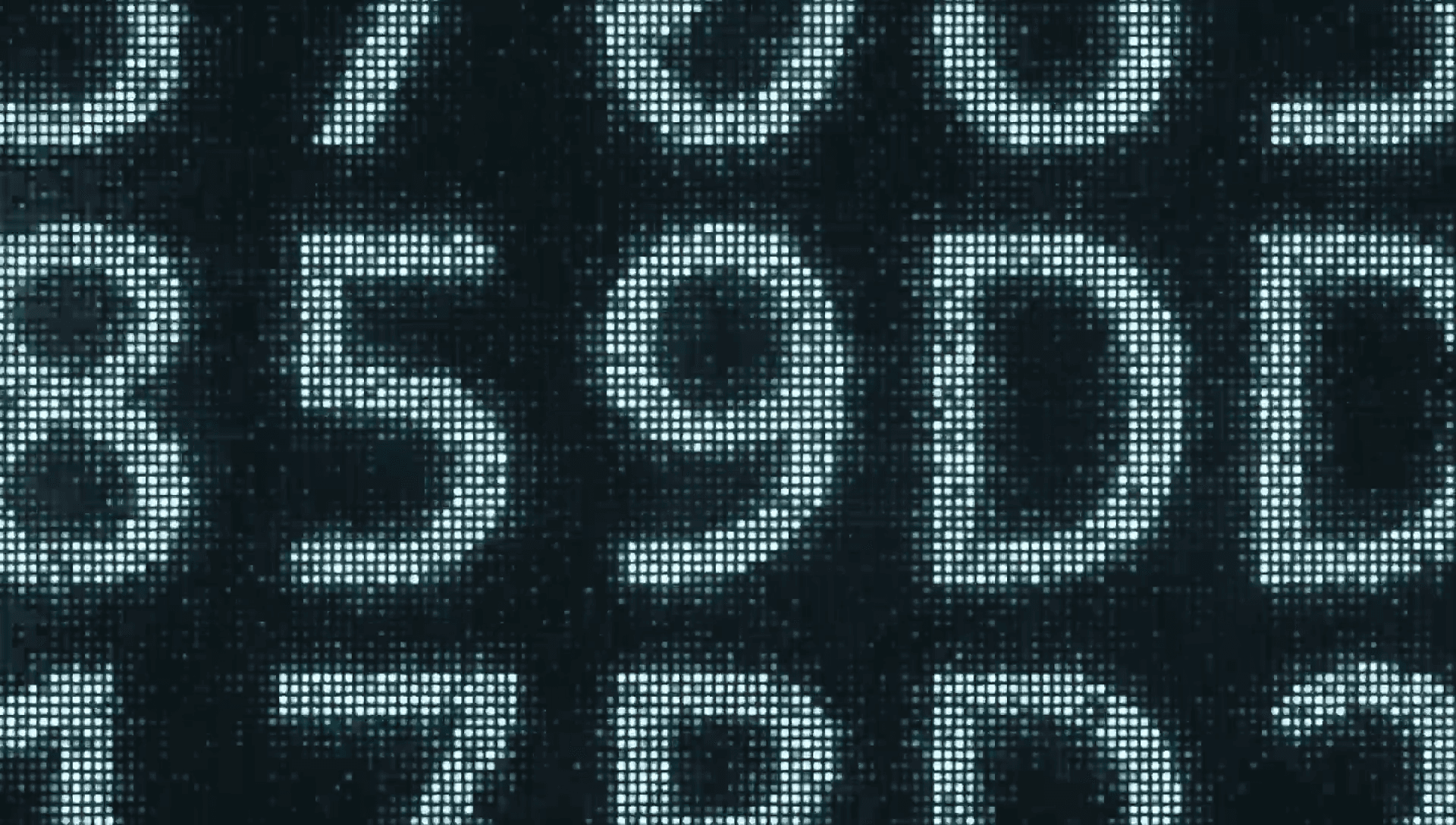 Close-up of a digital screen displaying alphanumeric characters made of small bright dots on a dark background, resembling an LED display. Prominently visible characters include '5', '9', and 'D'.