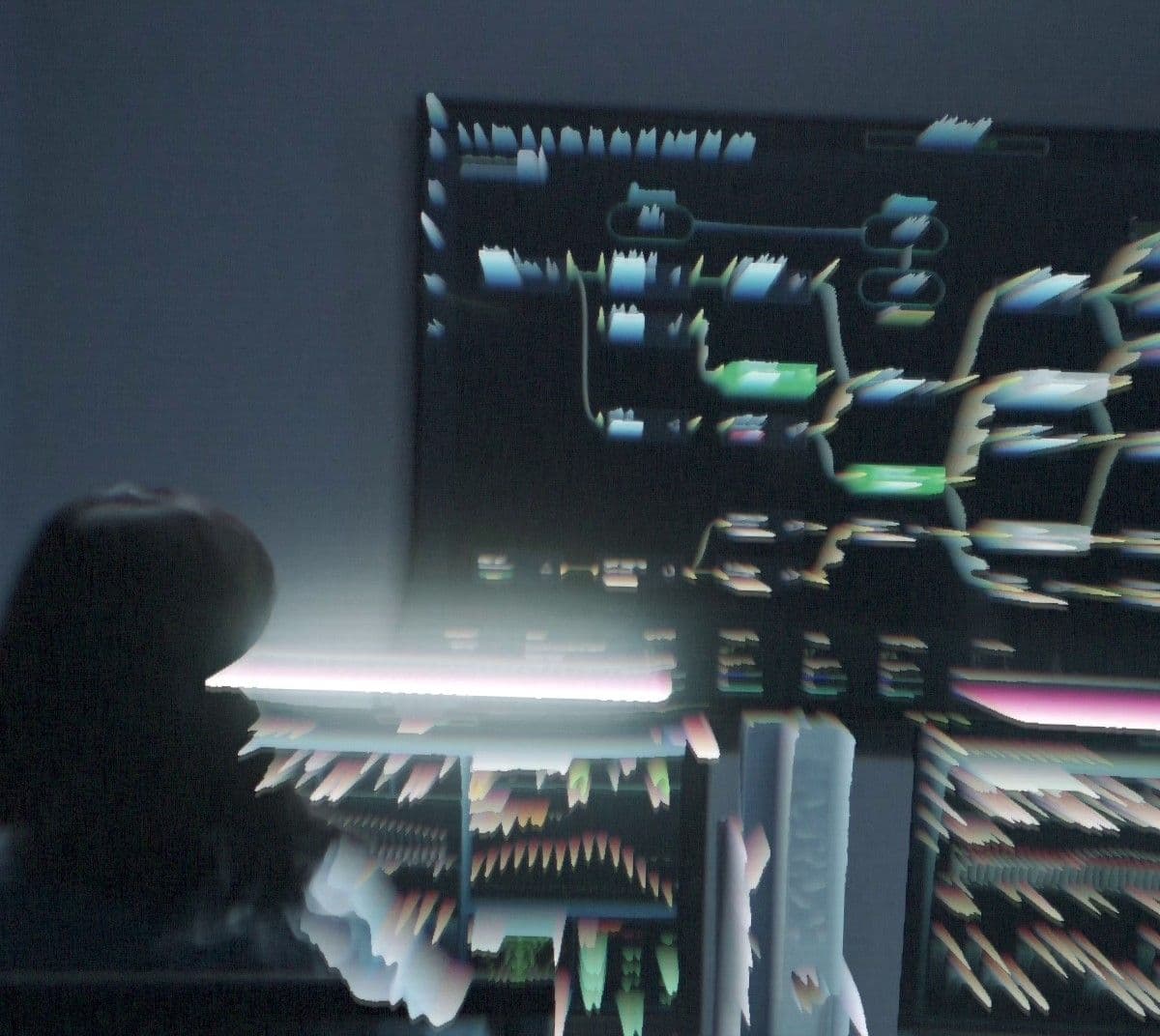 Blurred and distorted view of a control room with two silhouetted figures facing multiple large screens displaying various charts and data visualizations. The image has a digital glitching or motion effect, creating a dynamic and chaotic atmosphere.